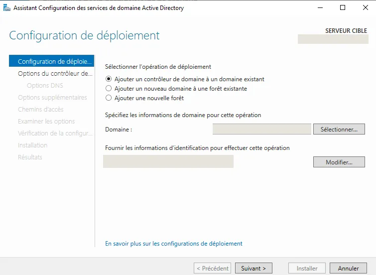 Assistant de configuration des services de domaine Active Directory, option « Ajouter un contrôleur de domaine à un domaine existant » sélectionnée ; serveur cible, domaine et compte masqués.